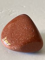 Goldfluss (aus geschmolzenem Quarzsand, mit Kupferoxyd.