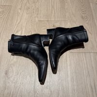 Hermès black leather ankle boots