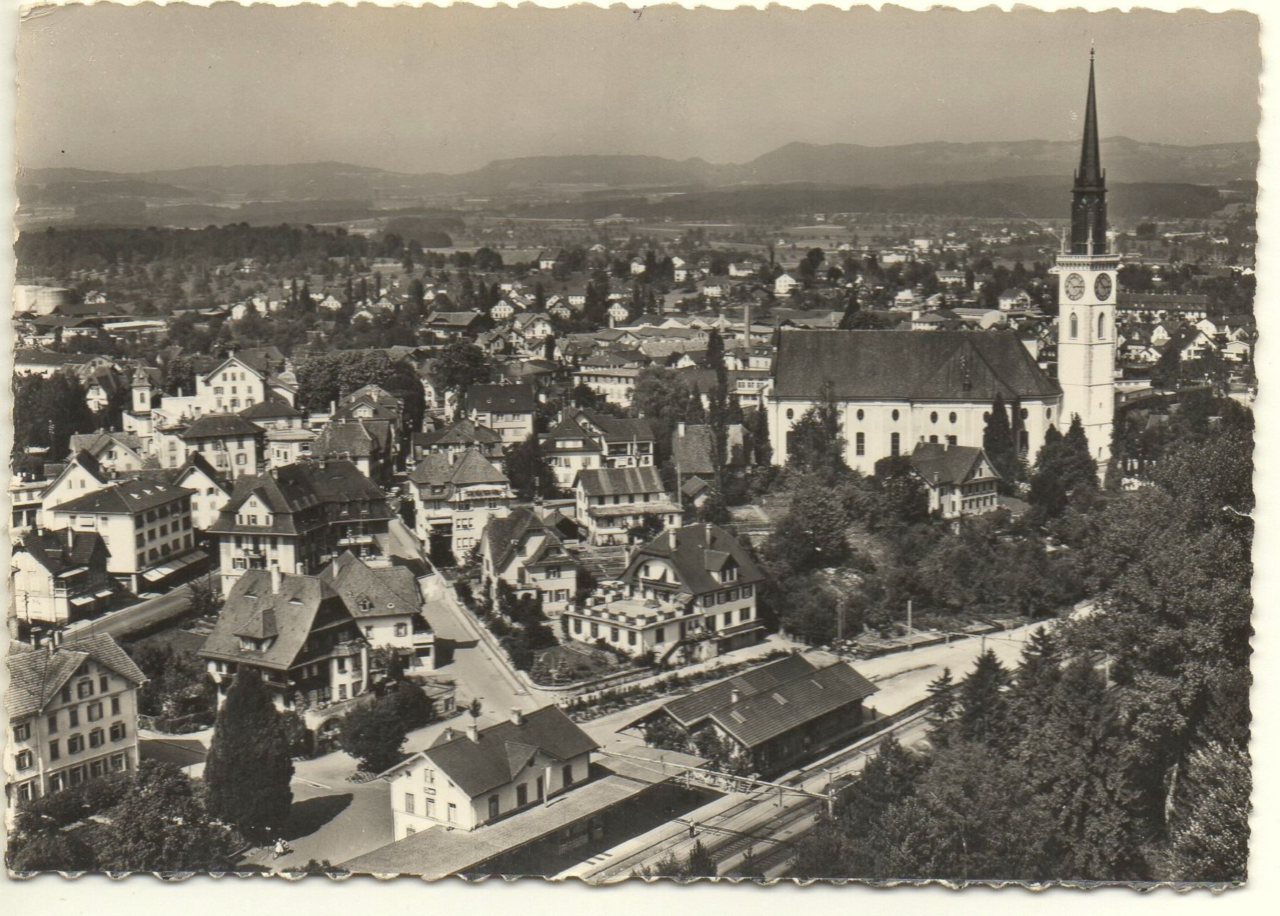 Cartes postales: CHAM Flugaufnahme mit Bahnhof – D'occasion à Jona par philajona