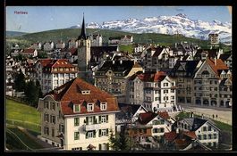 AK Herisau, Ortsansicht mit Kirche und Bergen im Hintergrund
