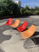Lot de 4 chaises design colorées état acceptable