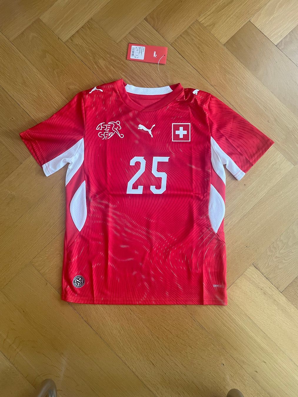 Puma Trainer, Turnhosen & -trikots: Original Puma Schweiz Trikot Sanches, Grösse 152 – Neu und originalverpackt aus Solothurn von rehbein 1