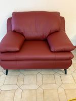 Fauteuil en cuir rouge couleur bordeaux état neuf