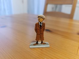 Figurine Tintin en relief diecast dans L'Oreille cassée
