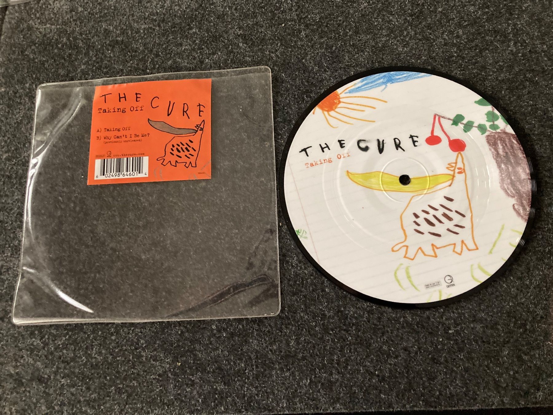 Dischi in vinile: The Cure - Taking Off  (Picture Disc) (7") – Usato da Fribourg venduto da Karushi