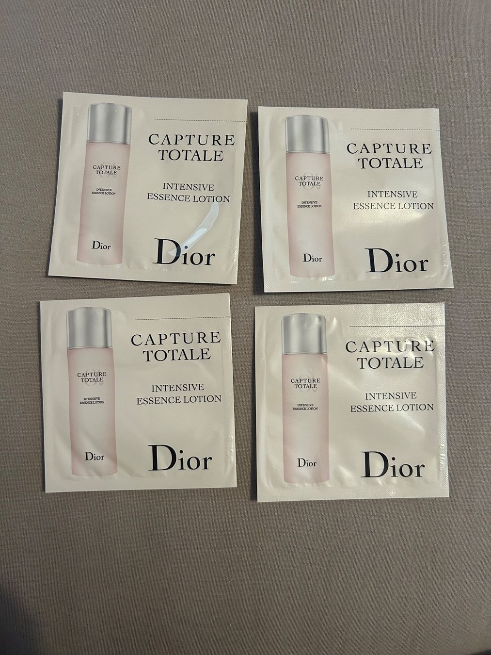 Dior Soins du visage: Dior Capture totale intensive essence lotion 4x samples NEW – Neuf avec emballage d'origine à Muzzano par