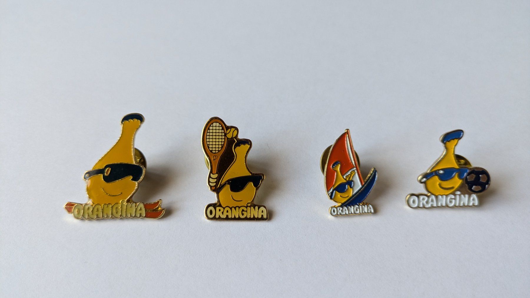 Placchette & Badge: Pin's Orangina – Usato da Estévenens venduto da Rockingirl