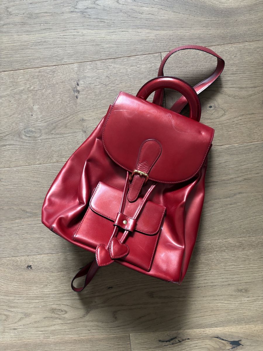 Moschino Zaini: Sac à dos Moschino rouge – Usato da le landeron venduto da Ciuffo