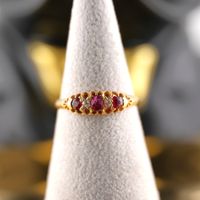 Goldring 18K mit Rubin und Diamanten