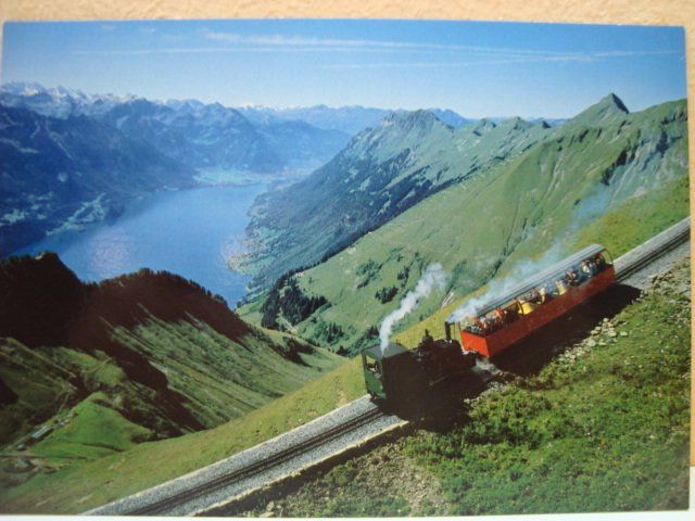 Cartoline postali: BRB Brienzer Rothorn Bahn mit Blick auf Brienzersee – Nuovo e nell'imballaggio originale da Thun venduto da Abigboss