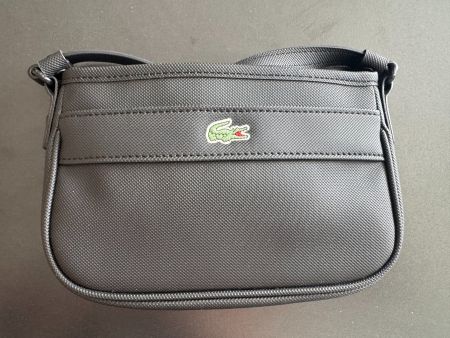 Sacoche Lacoste noire authentique - Prêt pour l'été!