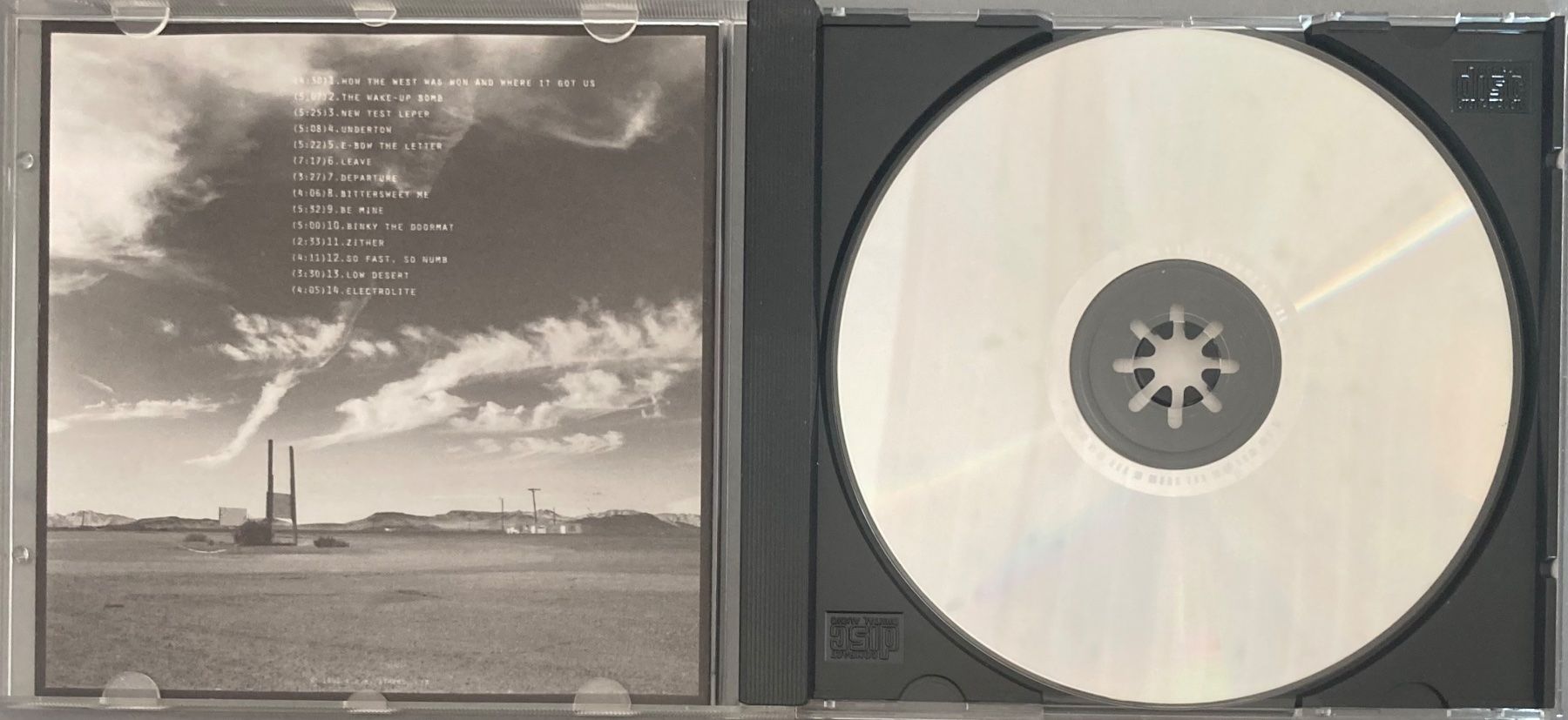 CDs: R.E.M. - NEW ADVENTURES IN HI FI – D'occasion à Poliez-Pittet par Newtown-Records 2