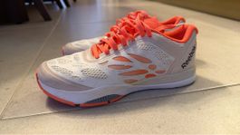 Chaussures de sport Reebok blanc orange état neuf