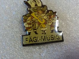 Ansteckpin 93: Fägi Musig