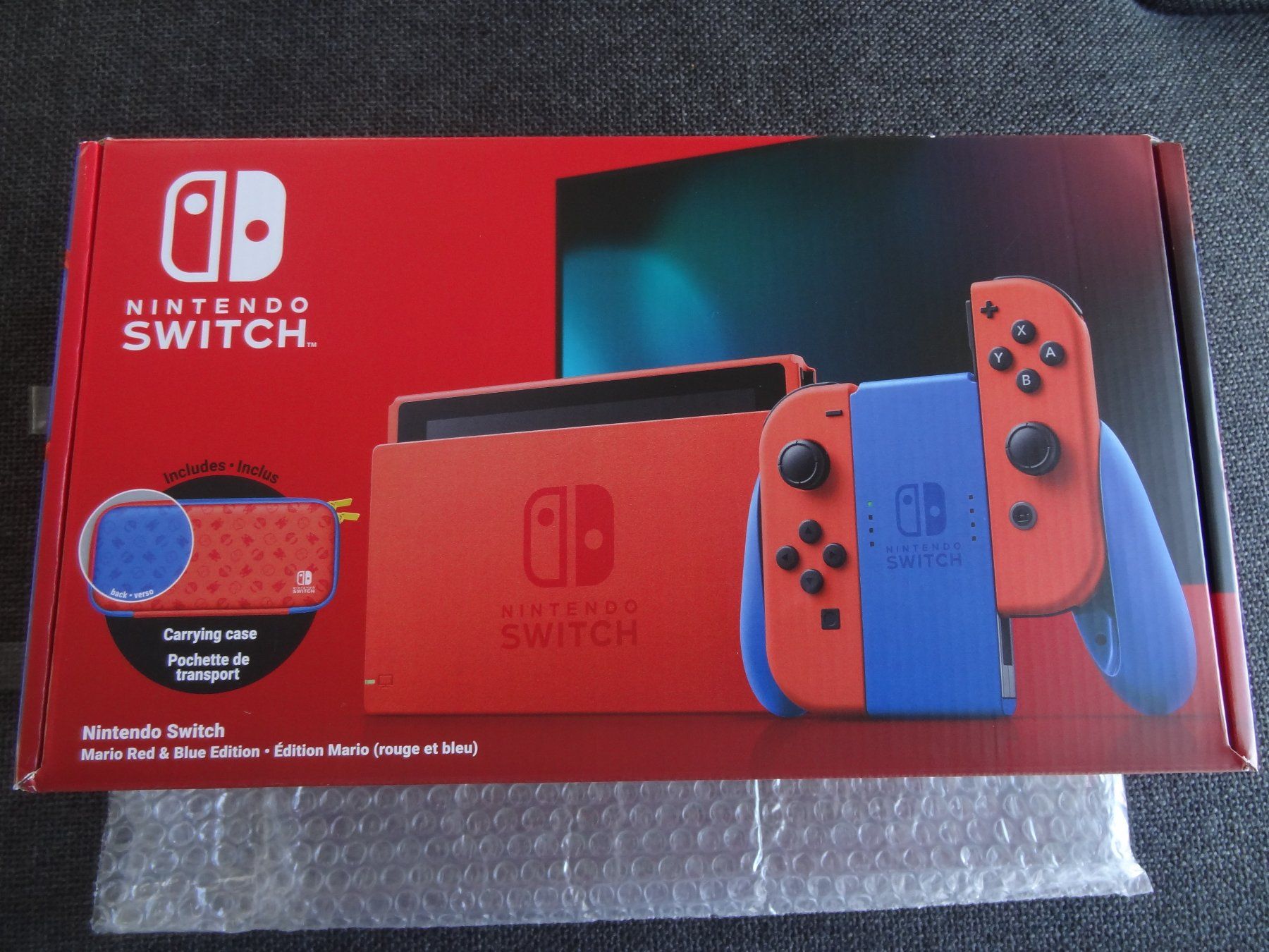 Nintendo Konsolen: Nintendo Switch V2 Mario Edition NEU – Neu und originalverpackt aus Lyss von Famicom