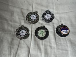 5 verschiedene silberne Medaillen 