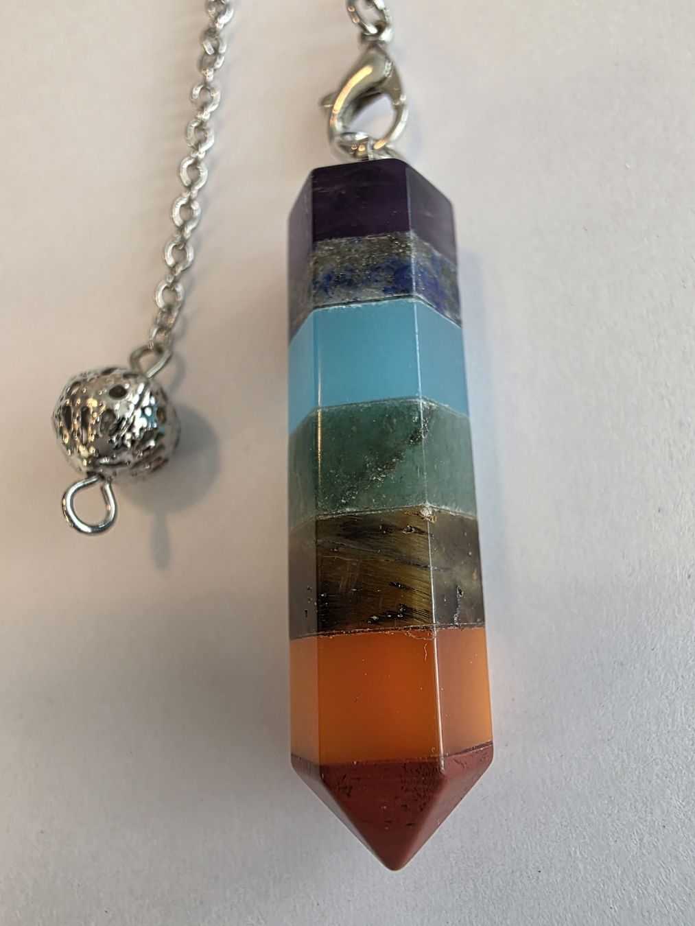 Minerali & Pietre curative: Chakra Stein Pendel 4cm.x1,2cm. – Nuovo e nell'imballaggio originale da Menziken venduto da Mirager