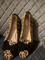 Chaussures plates léopard avec nœud noir neuves. Taille 36.