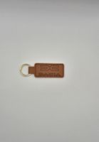 Dacia Schlüsselanhänger Braun mit Lasergravur