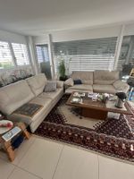 Leder Sofas hell  mit Relaxfunktion