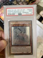 Yu-Gi-Oh Karte Der geflügelte Drache von Ra PSA 9 DE