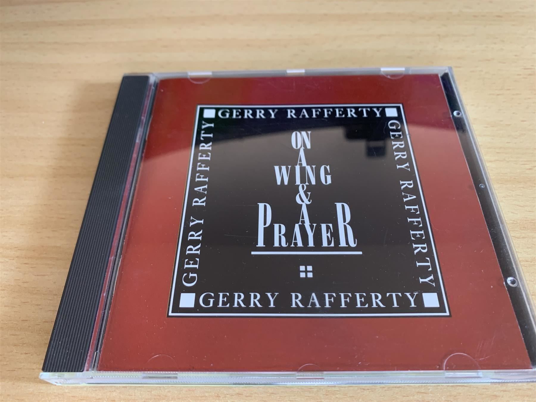 CD: Gerry Rafferty – On A Wing & A Prayer – Usato da Rikon im Tösstal venduto da Alpenmutz