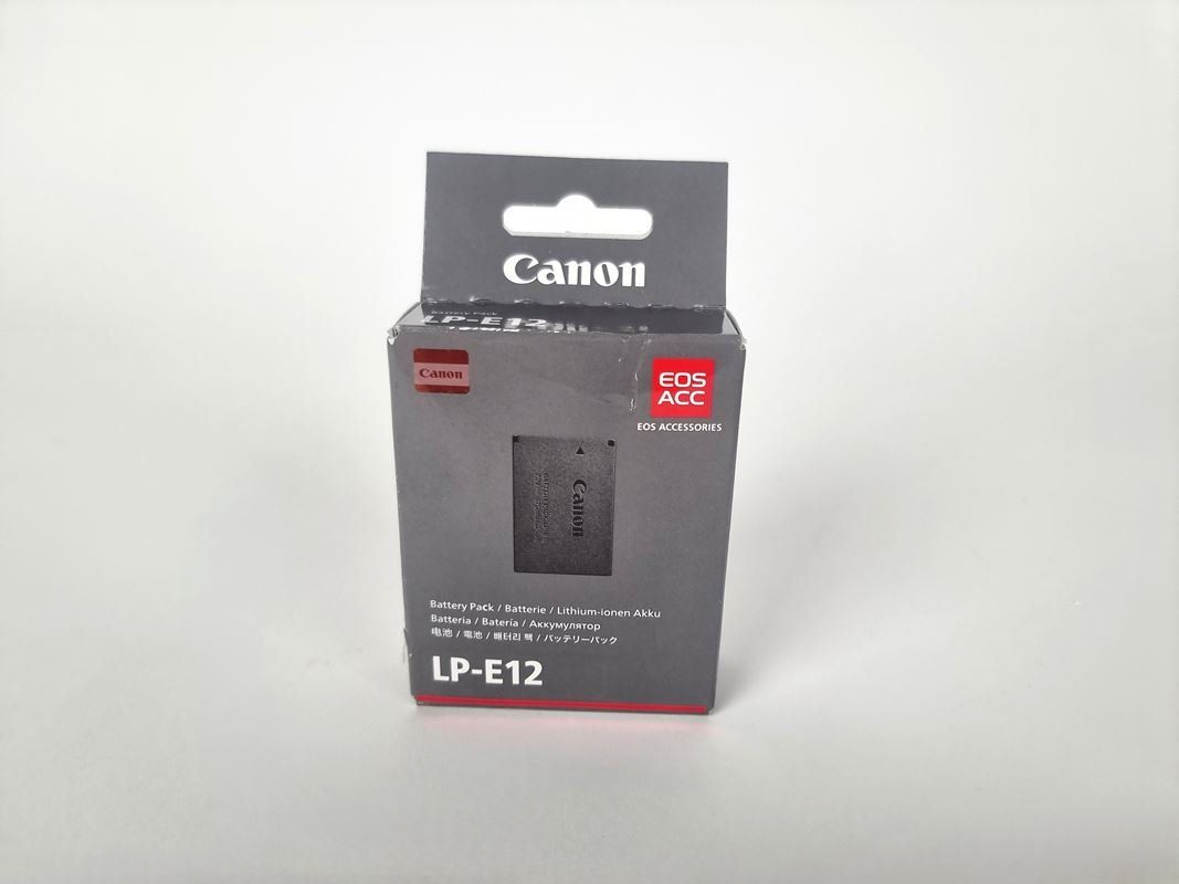 Canon Caricatori & Batterie: Canon Batterie LP-E12 – Nuovo e nell'imballaggio originale da Urtenen-Schönbühl venduto da Restwert_Schoenbuehl