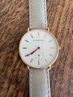 Roségold Armbanduhr mit grauem Lederband