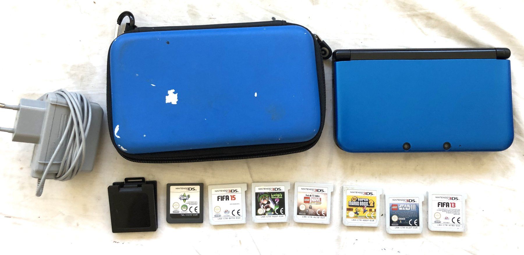 Nintendo Konsolen: Nintendo 3DS XL Blau - Bundle - Mit 7 Spielen & Tasche – Gebraucht aus Schaffhausen von durruti 1