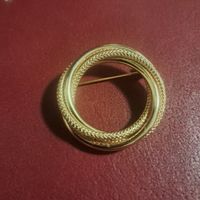 Brosche goldfarben rund geflochten guter Zustand