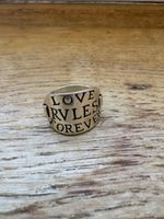 Ring LOVE RULES FOREVER Silber Farbe gebraucht Grösse 18 mm