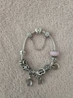 Pandora Armband mit 12 Charms und Sicherheitskette