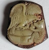 China: Jade Gürtelschnalle mit Greifvogel und Bär