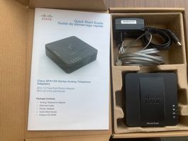 Cisco SPA122 ATA with Router analog telephone adapter