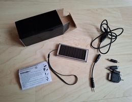 Solar Charger User's Manual SwissTS -Ladegerät für Unterwegs