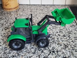 Spielzeug Traktor mit Schaufel
