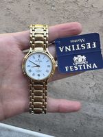 Festina Quartz NOS – 34 mm – Acier doré – vintage 90s.