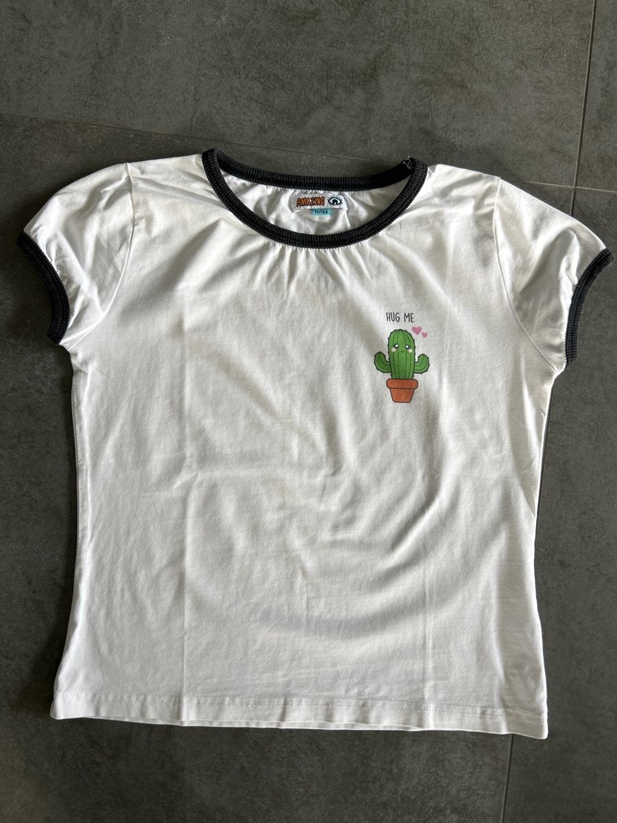 Camicette, T-shirt & Top: Très joli t-shirt 164cm – Usato da Yens venduto da Chriis