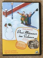 DREI MÄNNER IM SCHNEE 