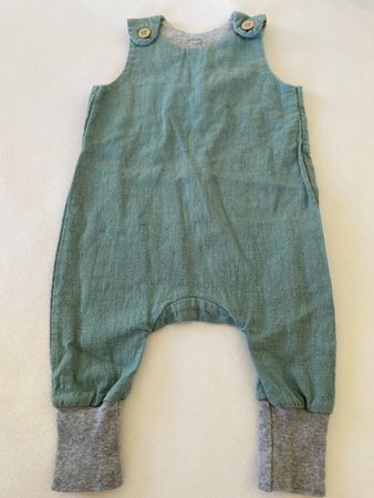 Baby Strampler eli-ju grün meliert sehr guter Zustand