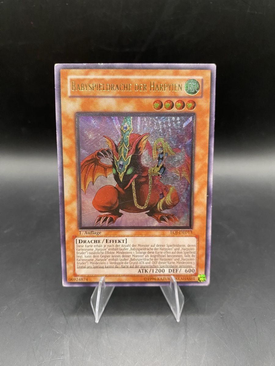 Yugioh Carte collezionabili: Babyspieldrache der Harpyien EOI-DE013 Ultimate 1st EX- – Usato da Kirchberg BE venduto da swiss_slab