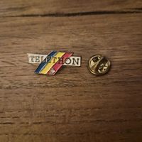 Pin’s Téléthon Suisse – couleurs nationales – émail  