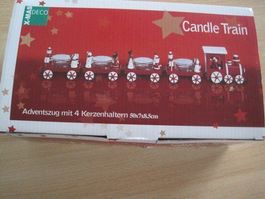 Adventszug mit 4 Kerzenhaltern