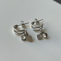 Silberne Edelstahl Zirkonia Herz Kreolen