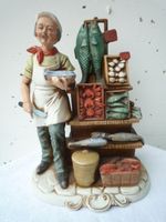 Marchand de poissons porcelaine biscuit