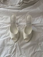 White Loubutin Heels