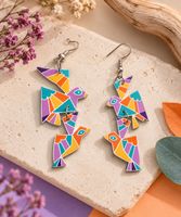 Boucles artisanales “ oiseau géométrique violet”