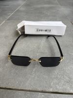 Sonnenbrille schwarz goldfarben randlos neuwertig