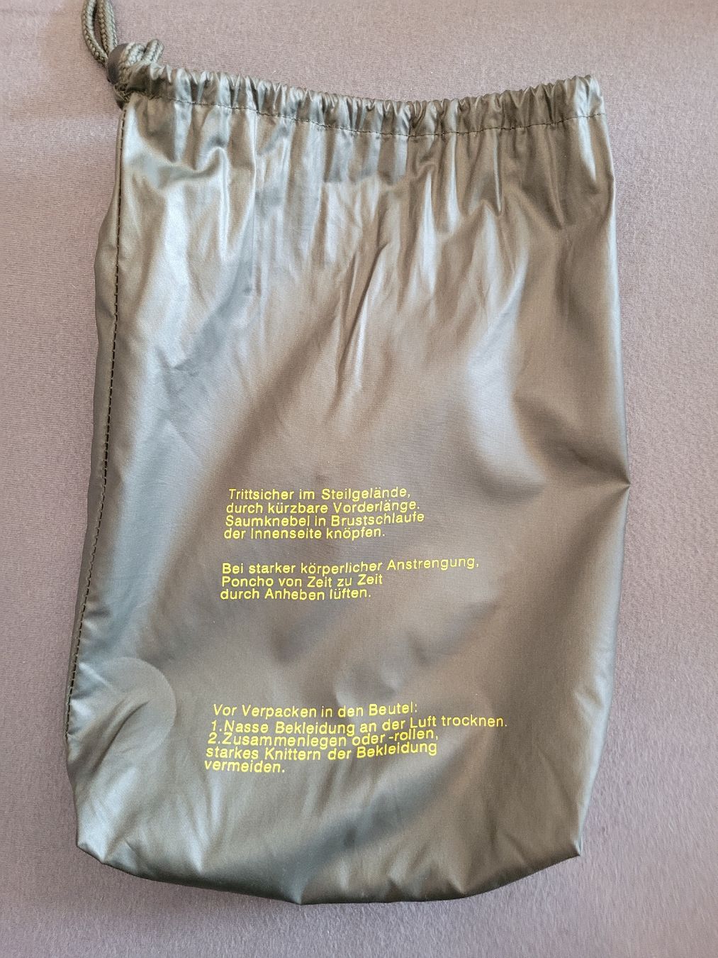 Giacche: Regenponcho – Usato da Aarburg venduto da Misohn 6