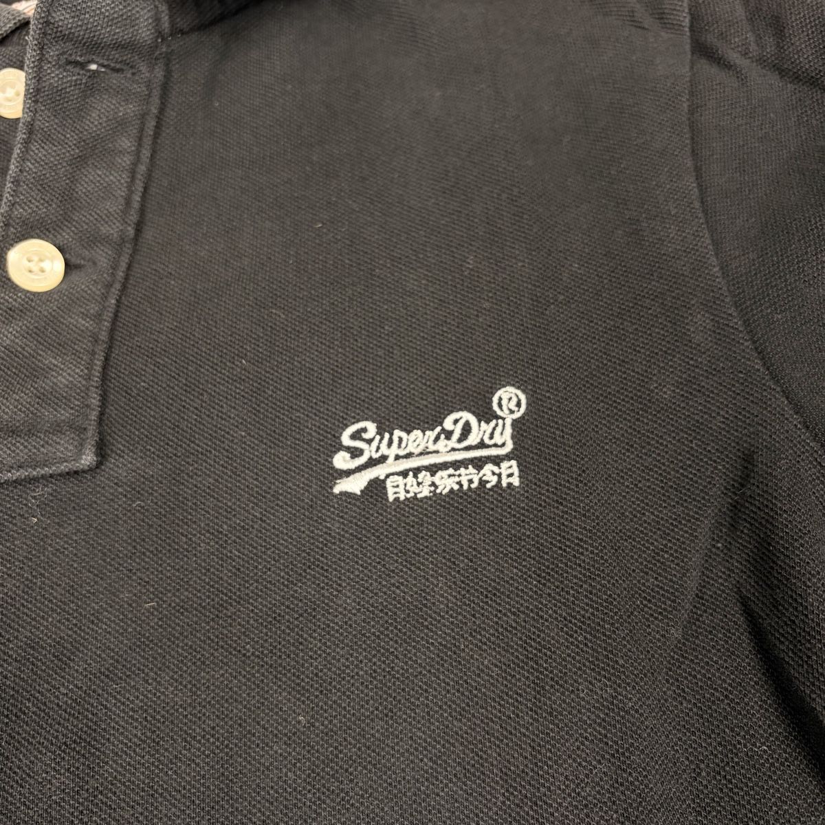 Superdry Magliette Polo: Polo SuperDry noir - Taille S  – Nuovo (secondo la descrizione) da Neuchâtel venduto da aliceguins 3